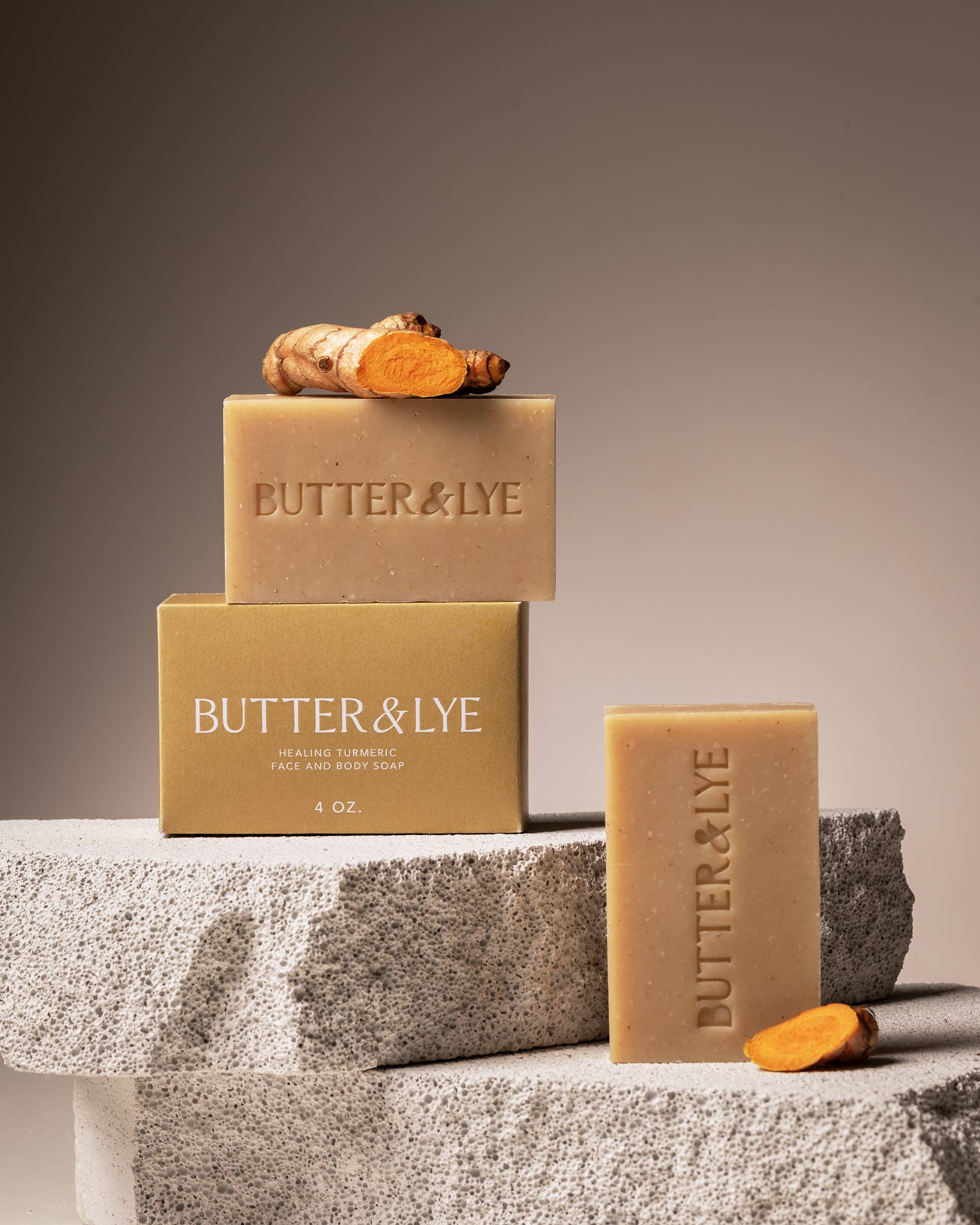 Butter & Lye healing turmeric face and body soap bar in plastic-free packaging