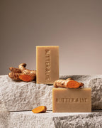 All-natural anti-inflammatory turmeric facial soap bars styled with natural decor