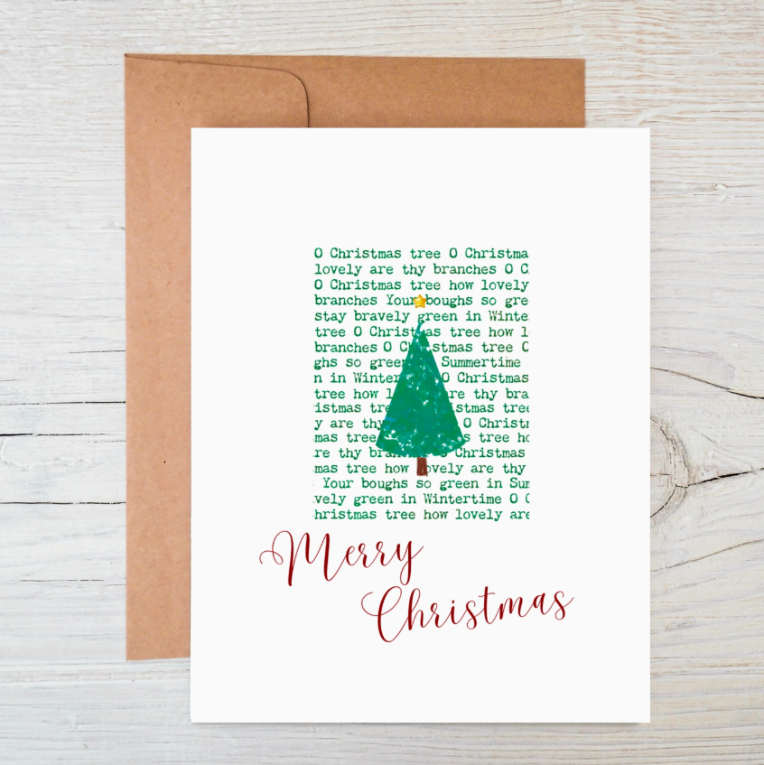 Plantable wildflower seed Christmas card featuring a green holiday tree design and recycled Kraft brown envelope.