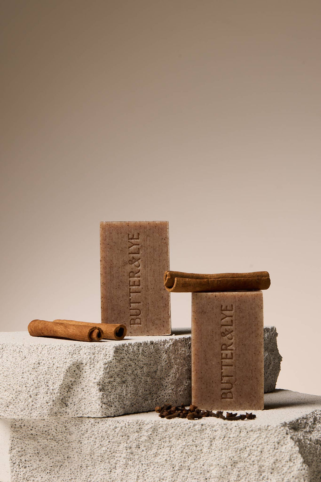 All-natural organic cinnamon and clove soap bars in plastic-free packaging